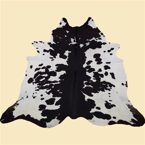 sac à dos imitation peau de vache noire et blanche